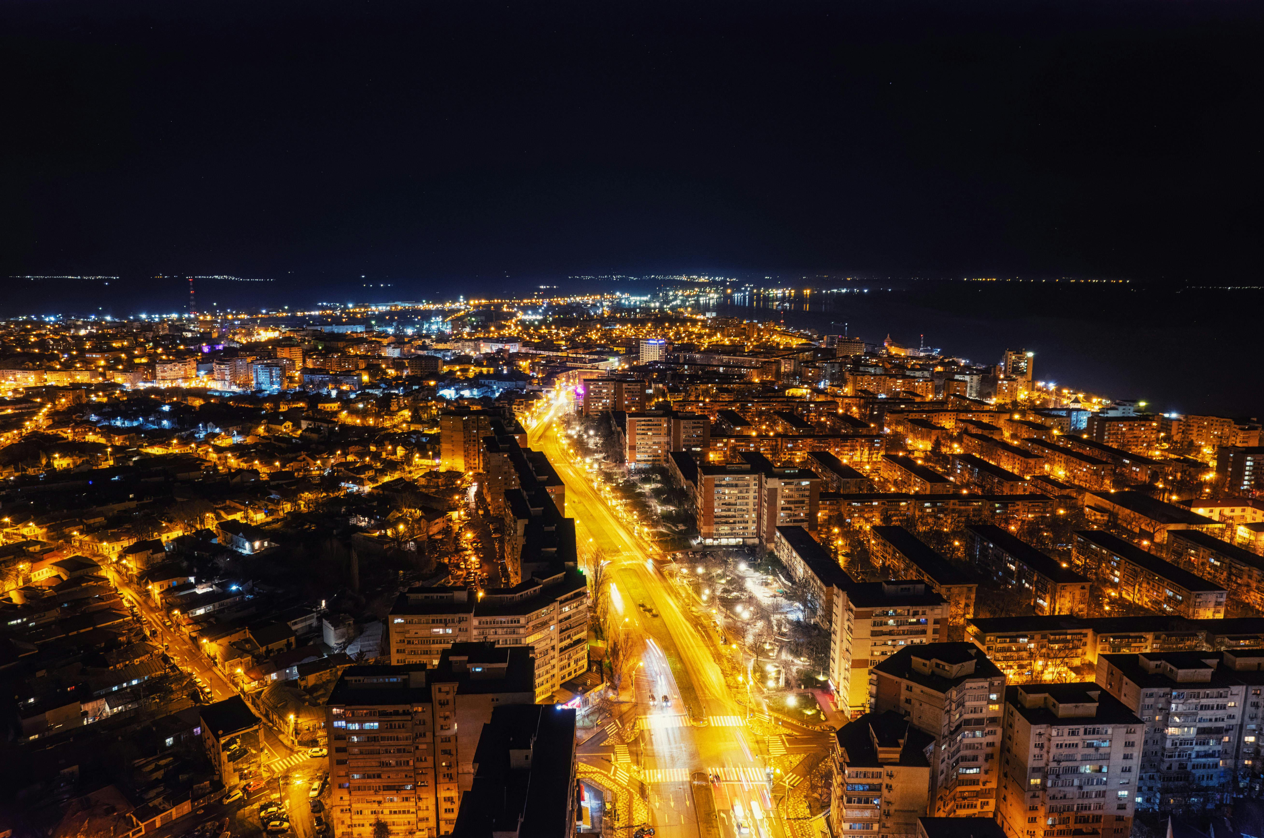 Bucharest city at night with illuminated buildings